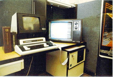 
     This is what the development system looked like.
     We connected a Volker-Craig VT-100 clone to the serial port, and a TV to the NTSC output of the TI 9918 video chip.
     Notice the 8-inch floppy drives.
  